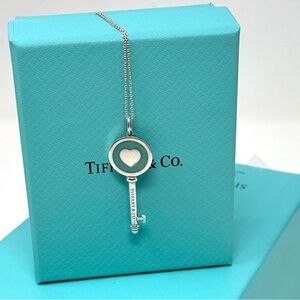 Authentic Tiffany & co. Enamel Blue Heart Key Pendant Necklace.